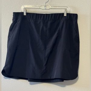RBX Active Stretch Woven Athletic Skort with Attached Bike Short and Pockets